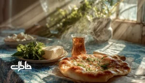 میز صبحانه ایرانی با نان داغ، چای، پنیر و سبزی در نور روشن و خنک صبحگاهی. روان‌شناسی بو