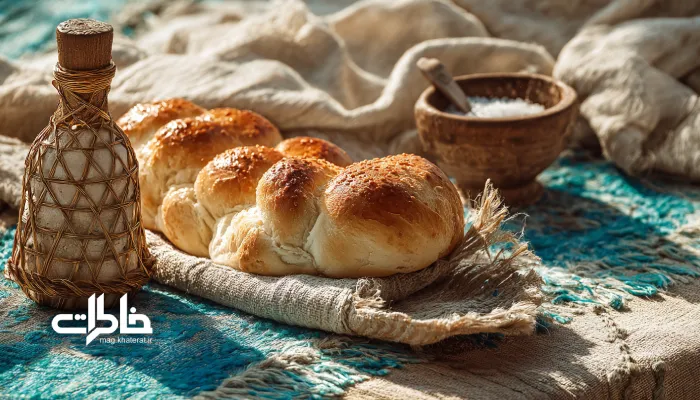 سفره سنتی ایرانی با نان سنگک و نمکدان؛ نماد سادگی و برکت سفره ایرانی. نان در شعر