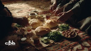 سفرهٔ سادهٔ نان و نمک با نان سنگک، سبزی، پنیر و چای؛ نماد مهمان‌نوازی ایرانی و دورهمی کم‌هزینه برای تقویت رفاقت و اعتماد.