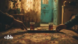صحنهٔ آشتی ایرانی با دو استکان چای و یک حبه قند؛ نمادی از آشتی و شفای عاطفی در فضای خانه