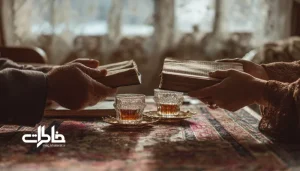 مبادله کتاب در نشیمن ایرانی با فرش سنتی، فنجان‌های چای و لبخندهای دوستانه؛ مهمانی کتاب و تبادل حافظه در فضای خانه‌ای گرم و صمیمی