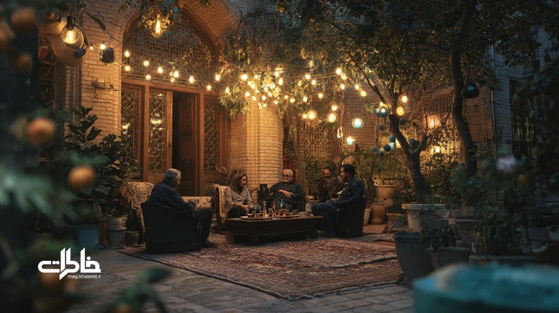 دورهمی خانوادگی در حیاط ایرانی با تلفن همراه و اسپیکر کوچک برای موسیقی جمعی در عصر دیجیتال؛ چراغهای ریسه و چای روی میز