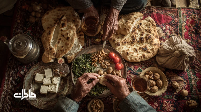 سفره ایرانی با نان سنگک داغ، پنیر و سبزی خوردن، گردو و استکان چای؛ بازنمایی لقمهی سادگی و خاطرات دورهمی در خانههای ایرانی