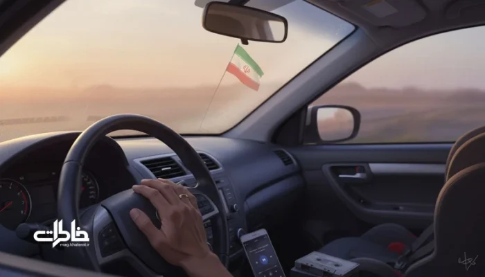 نمای نزدیک از دست روی فرمان در ماشین هنگام شنیدن «ای ایران» با حس بغض و خاطره جمعی